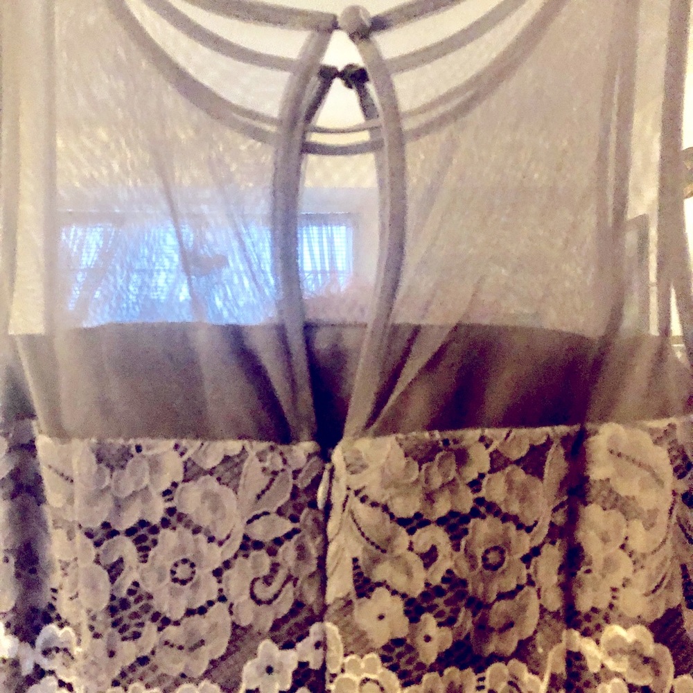 Lovely, classy, comfortable dress.  It is an antique lavender color.